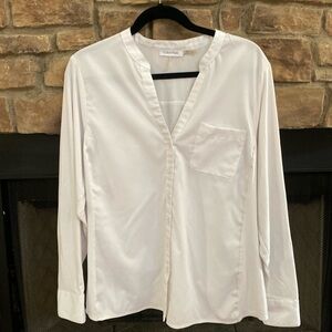Calvin Klein white button down V-neck top with gold bar detail on cuffs. Size OX